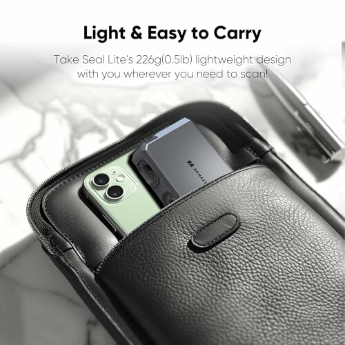 Portable scanner and phone in a leather case.